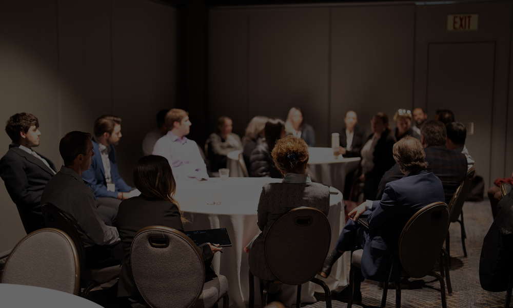 Panelists sharing insights on regulatory challenges in clinical research at Precision in Clinical Trials Summit