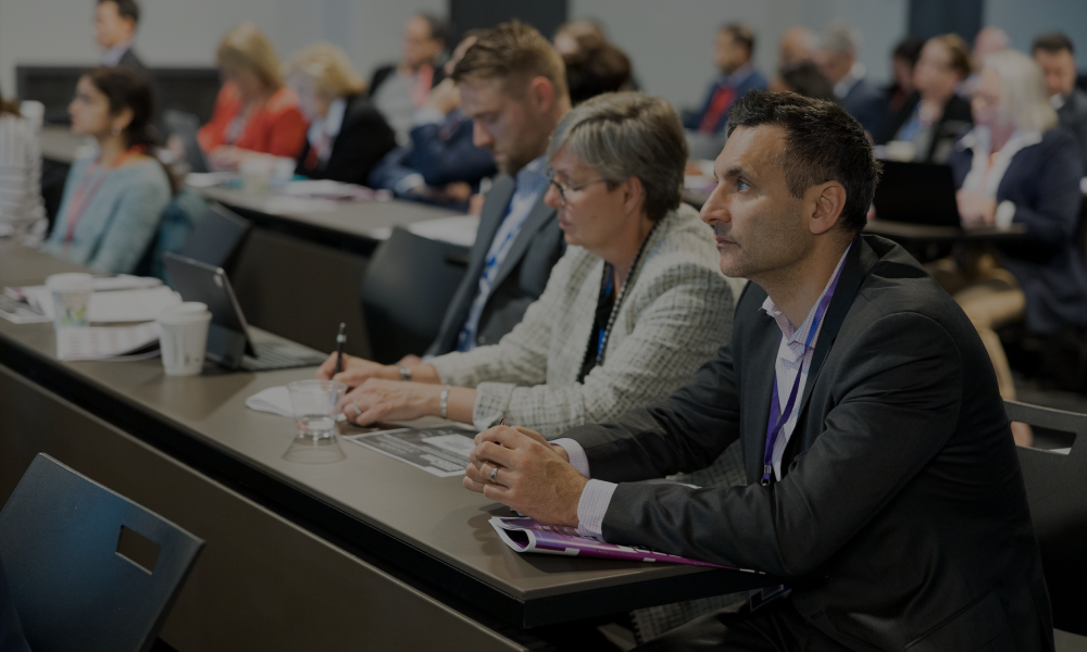 Panelists sharing insights on regulatory challenges in clinical research at Precision in Clinical Trials Summit