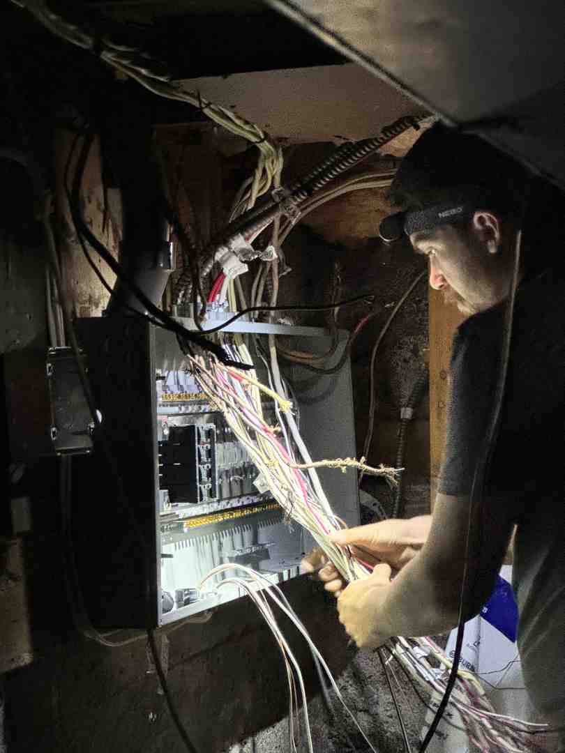 infographic showing residential electrical services on the left including panel upgrades lighting installation and home wiring and commercial electrical services on the right including maintenance plans warehouse projects and fit-ups with icons representing each service type - electrical burnside ns