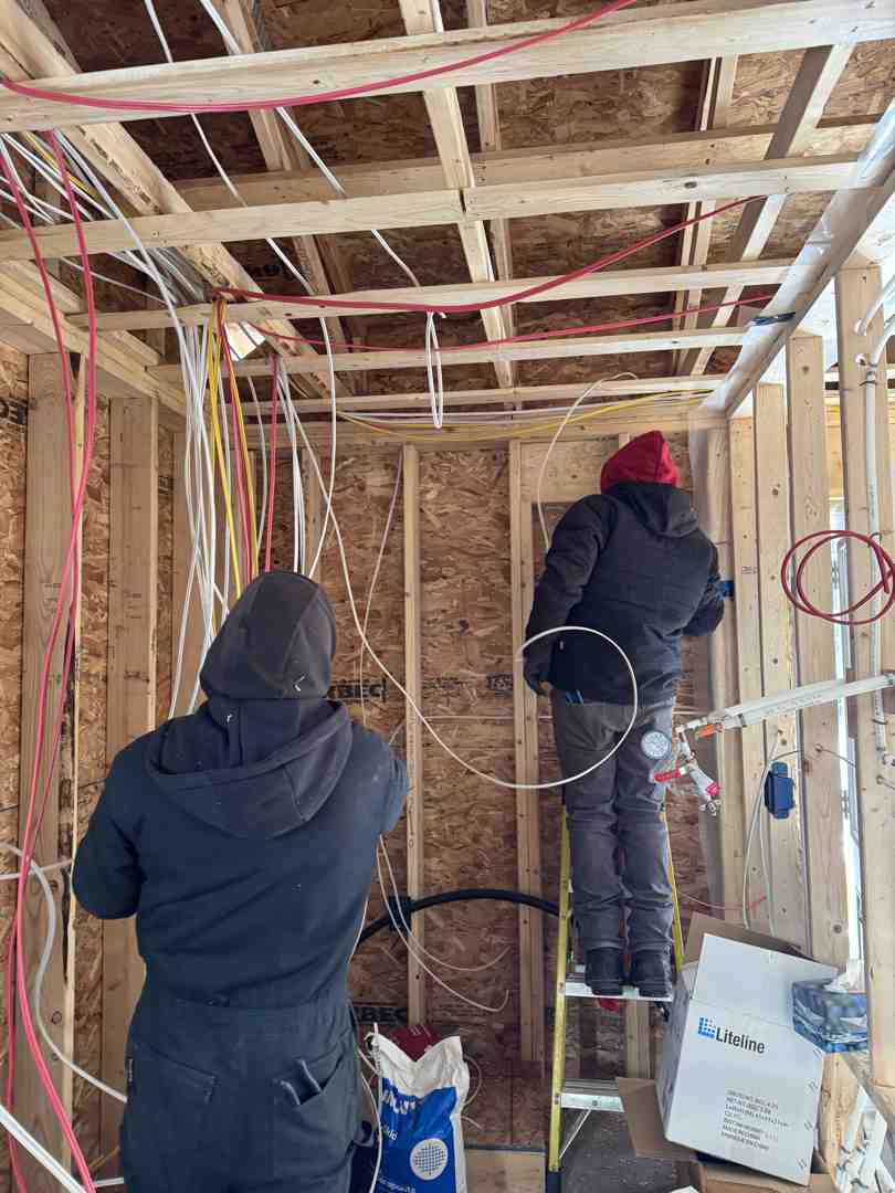 Infographic showing electrical service types in Fall River NS including residential service upgrades, new construction wiring, renovation work, pool and spa connections, heat pump installations, generator hookups, smoke and CO2 detector installation, and communications cabling, with permit requirements and Red Seal certification standards - electrical fall river ns