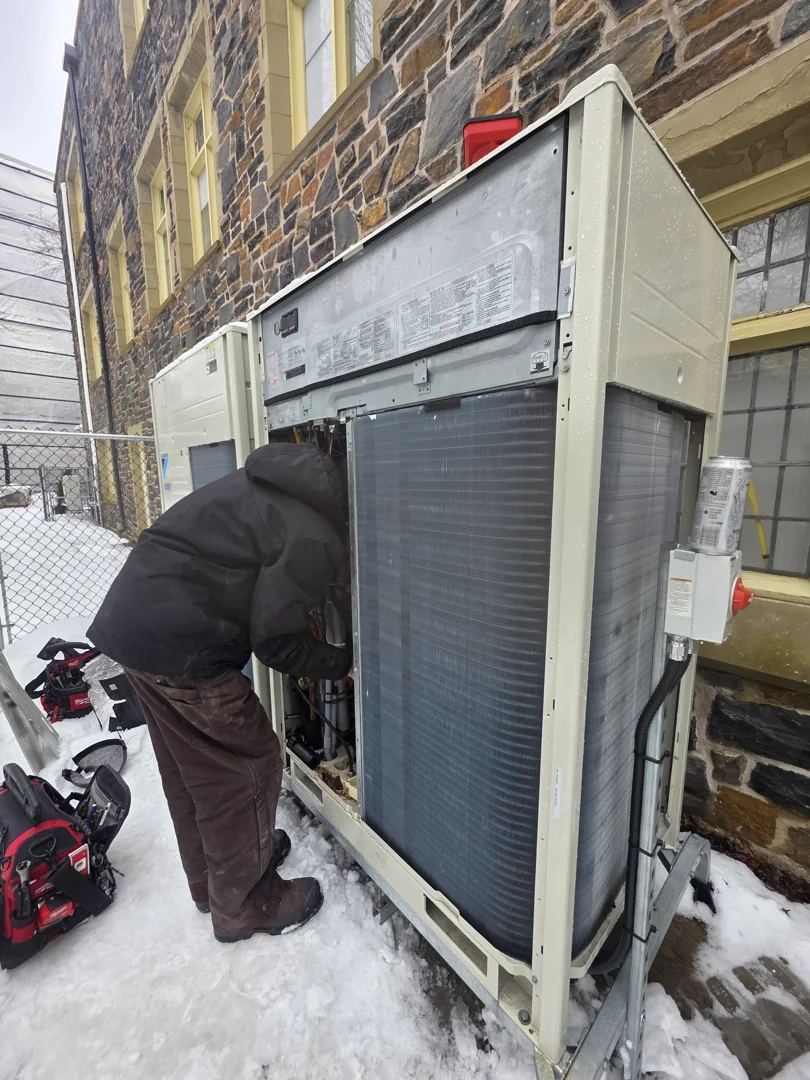 Corroded condenser coils on a commercial HVAC unit showing damage from salt air Corroded condenser coils on a commercial HVAC unit showing damage from salt air