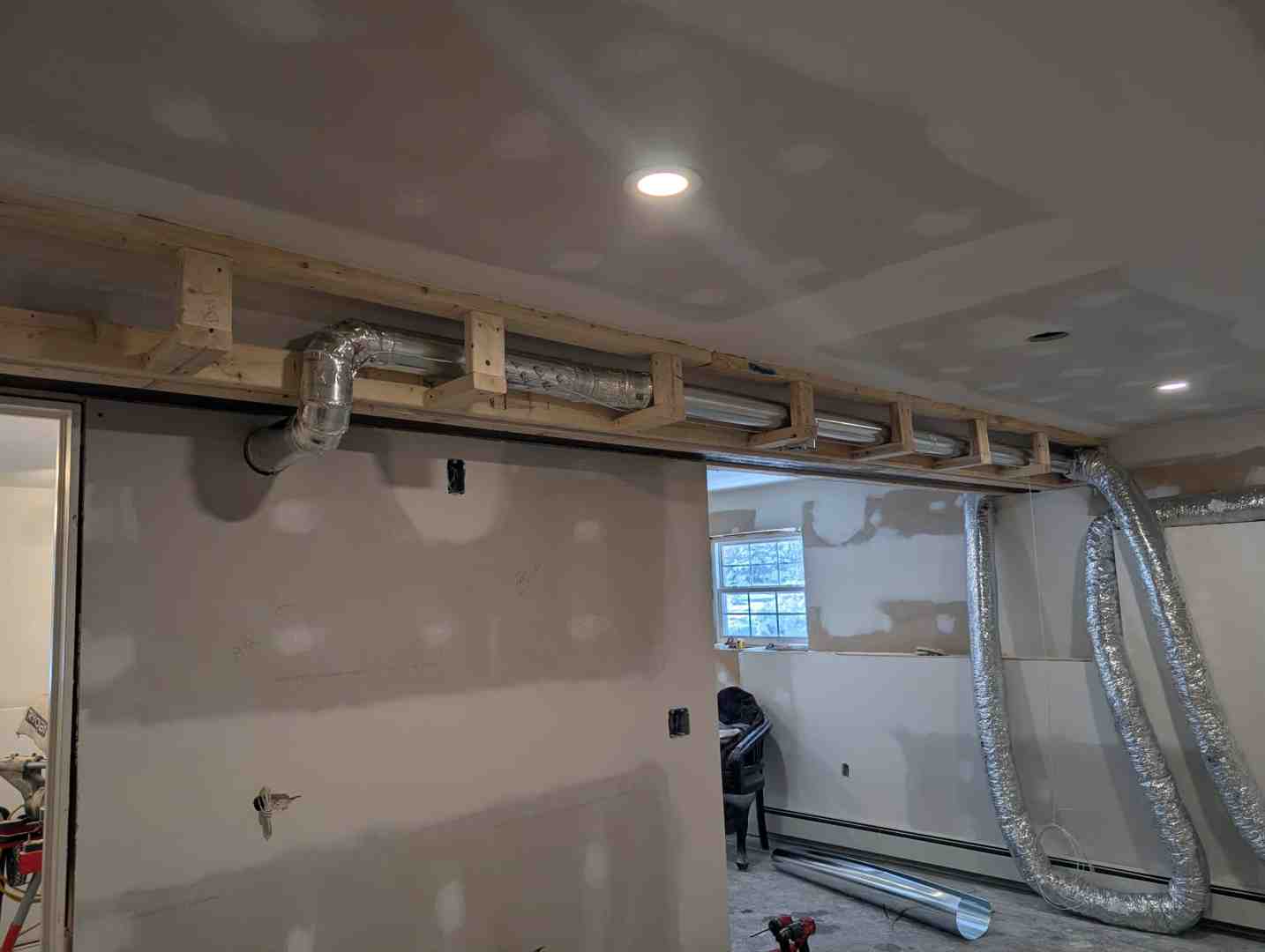 Custom ductwork installation in a new build house showing clean lines and sealed joints
