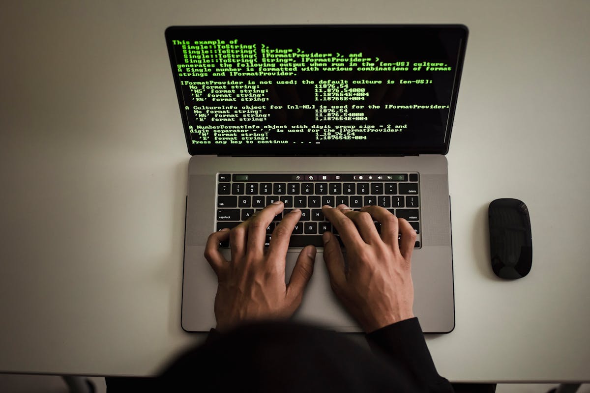 Host reviewing vacation rental property management software on laptop