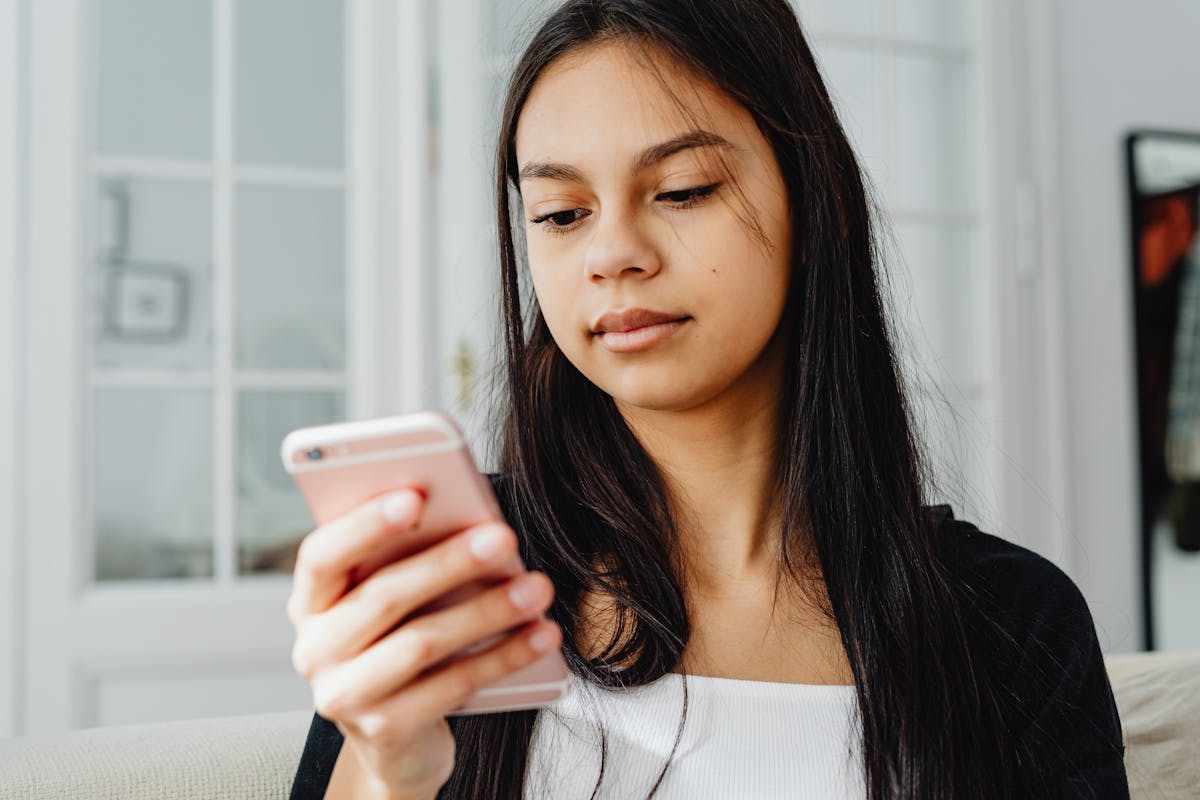 Woman texting on smartphone