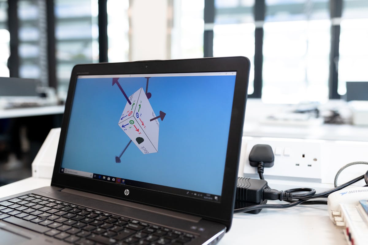Laptop showing design and management software