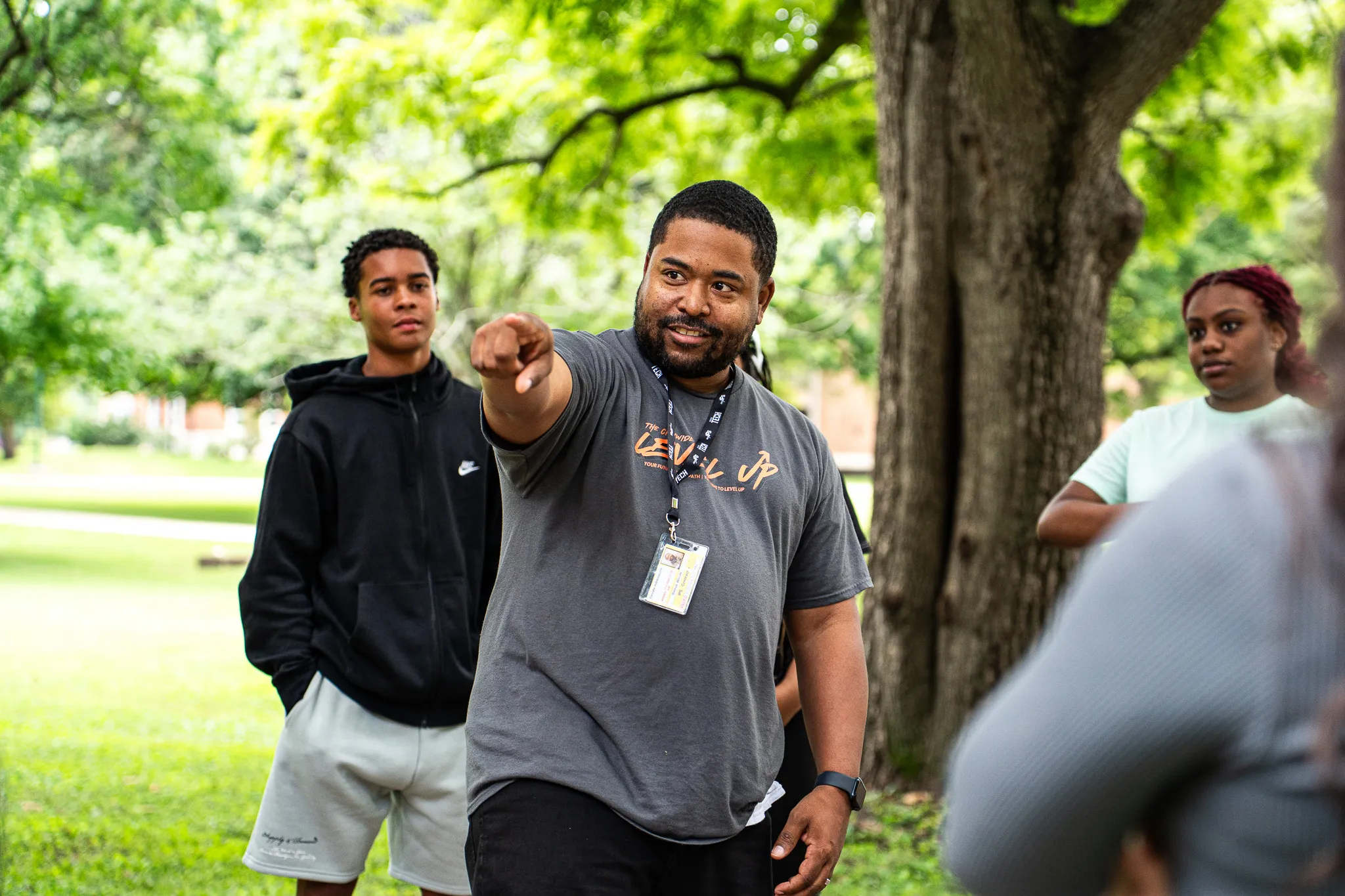 A male staff member and a male student engaging in a serious conversation