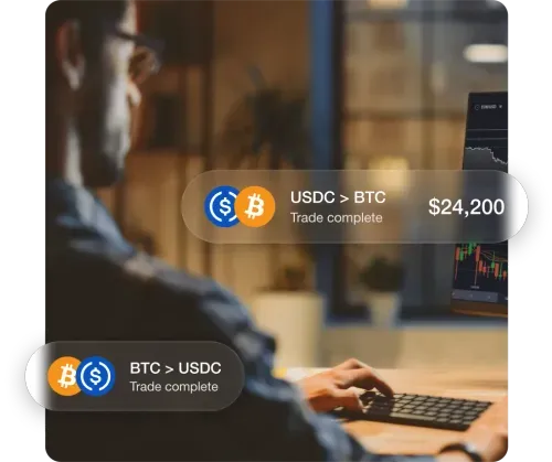 Image of a man looking at a digital exchange. There are overlay UI alerts of trades being completed.
