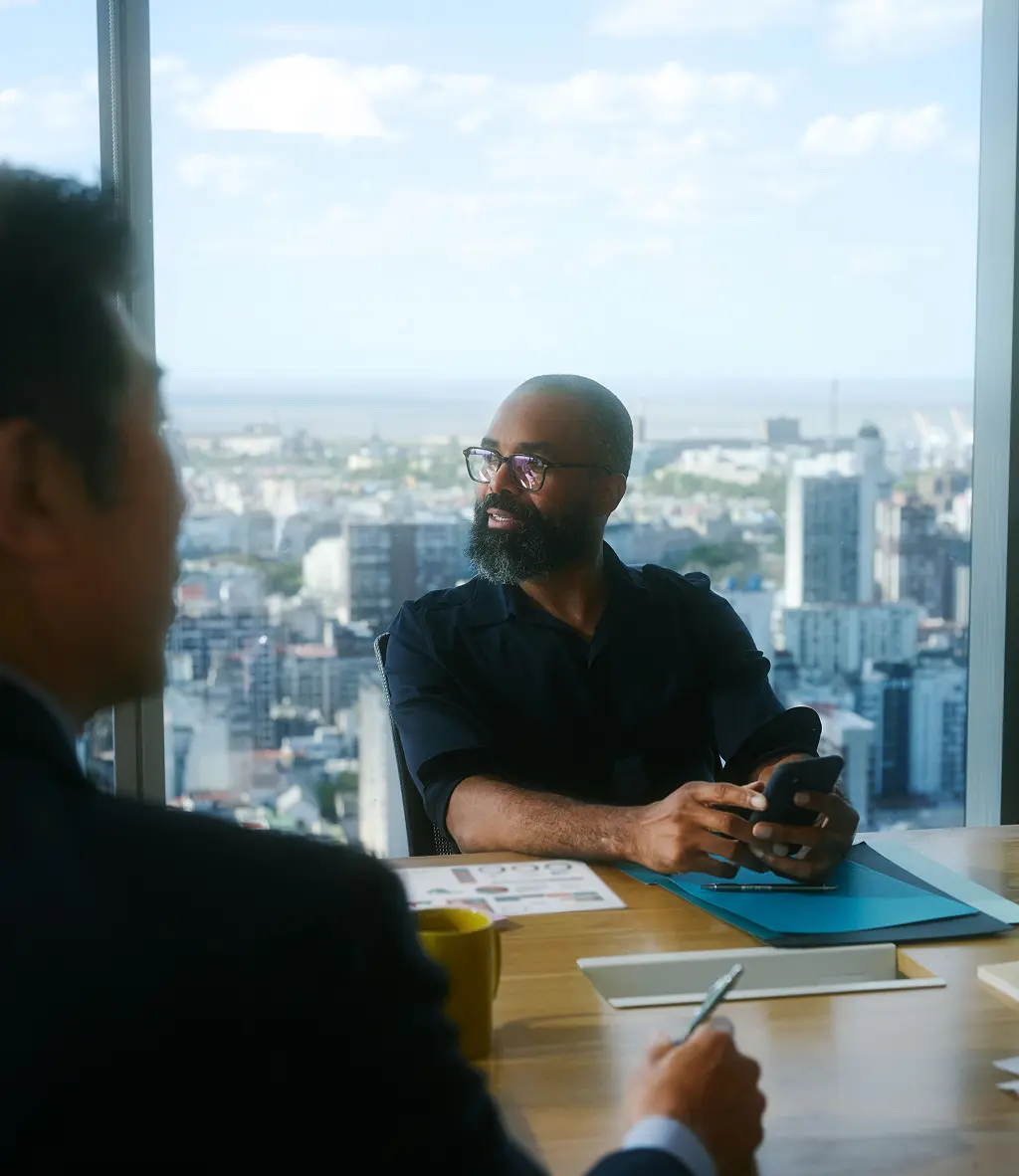 People in a meeting in a high rise office