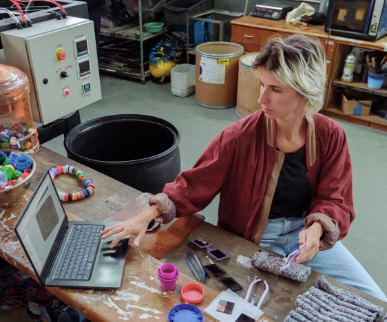 Image of person working and looking at laptop