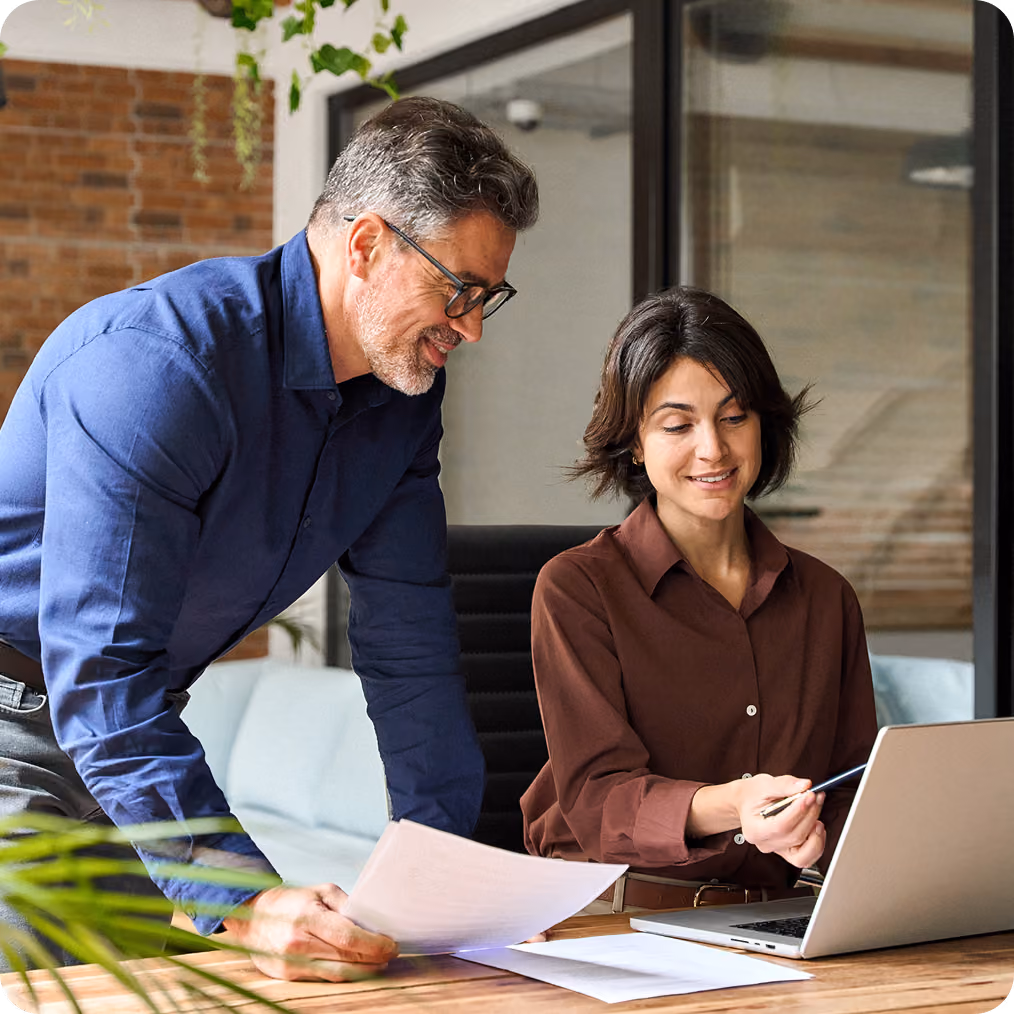 two people collaborating in an office setting