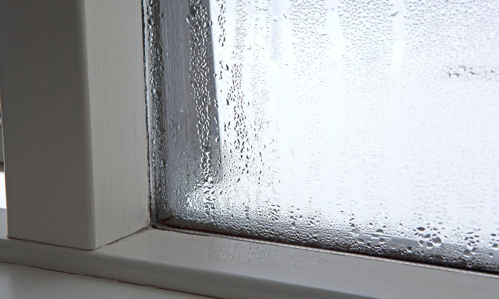 Condensation forming on a window.