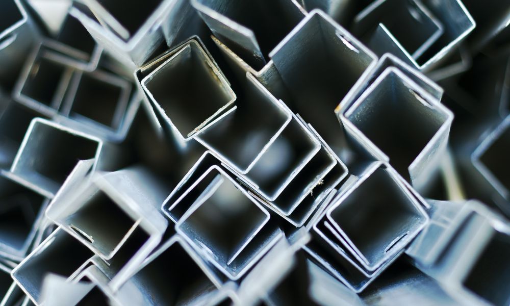 Galvanised steel bars grouped together.