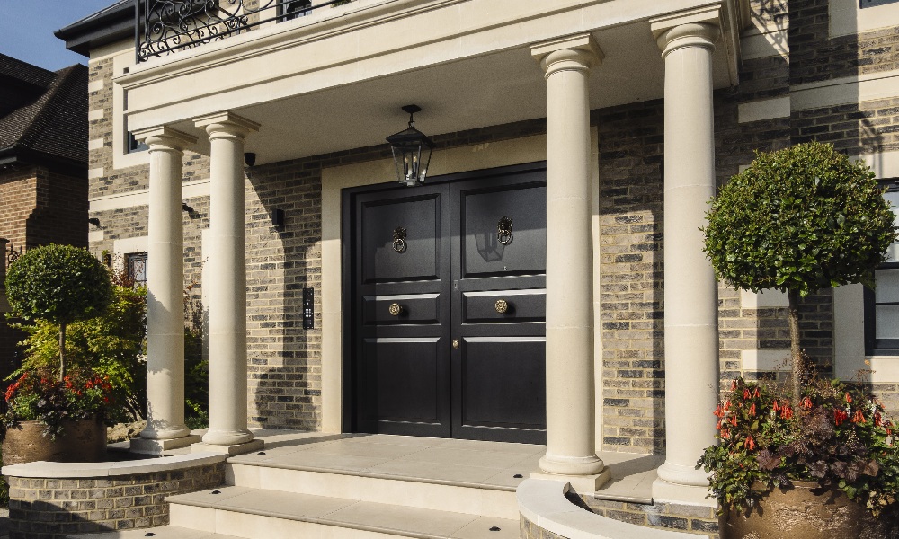 A double front door with lantern-style light.