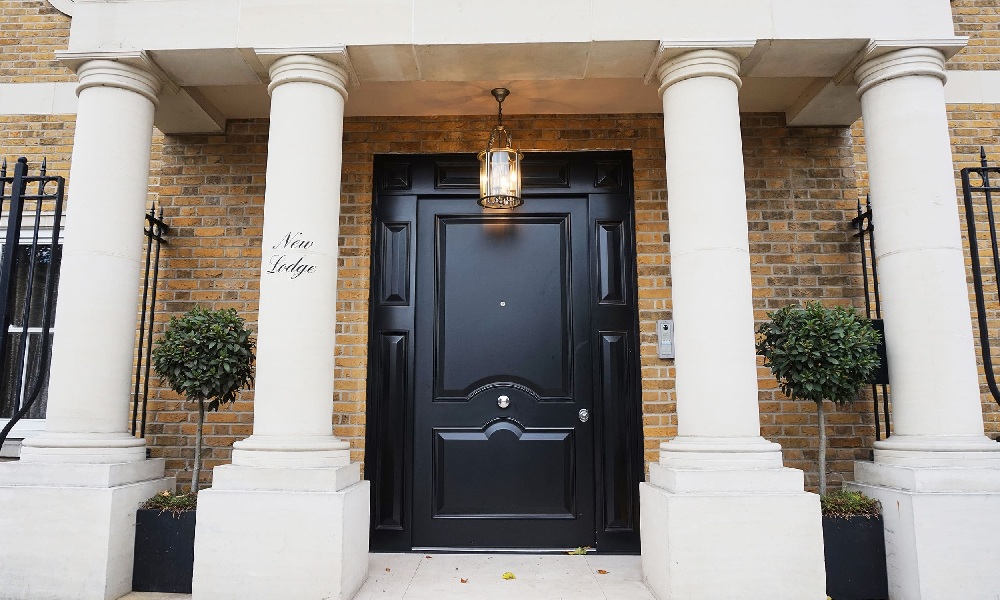 A front door porch with a lantern light.