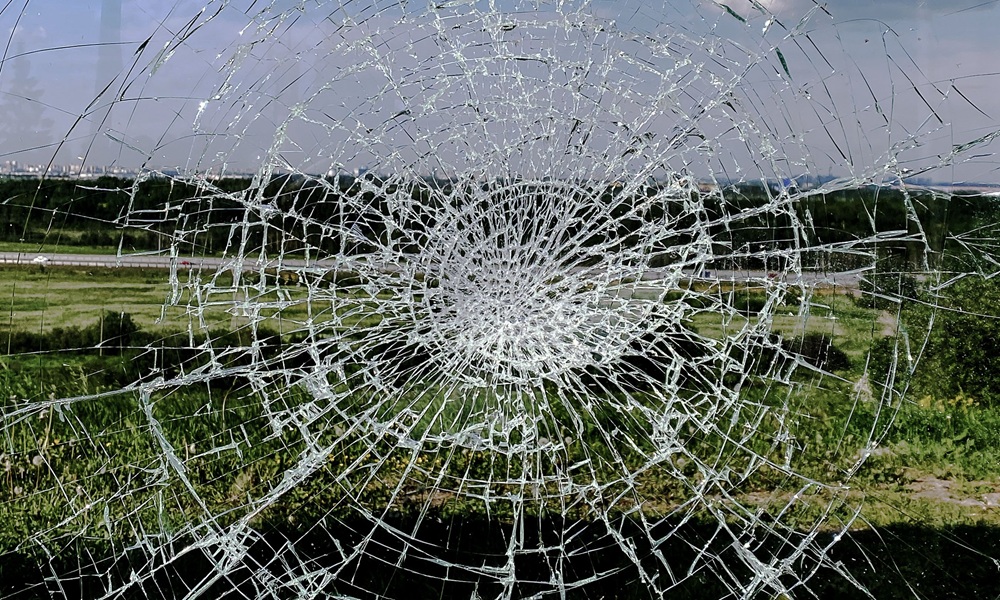 Broken laminated glass of a security window.