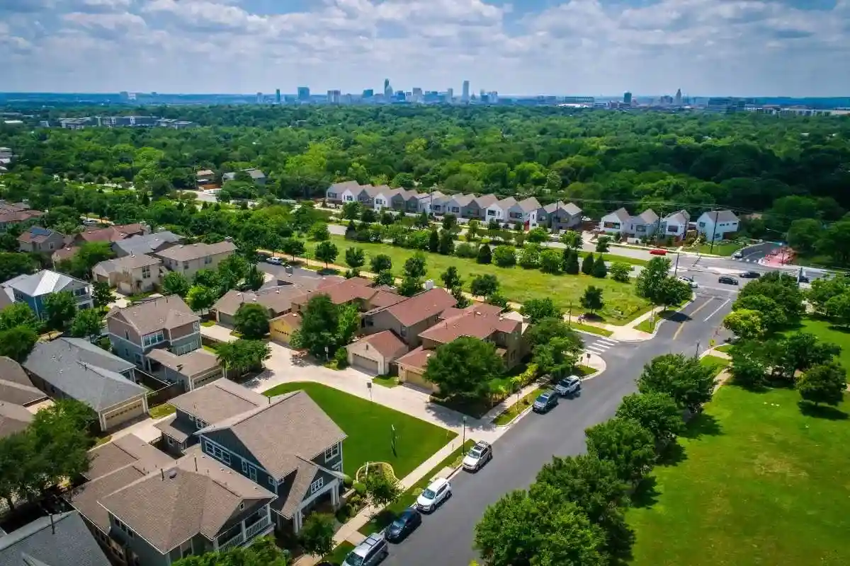 Urbanization leads to deforestation through expanding cities and infrastructure.