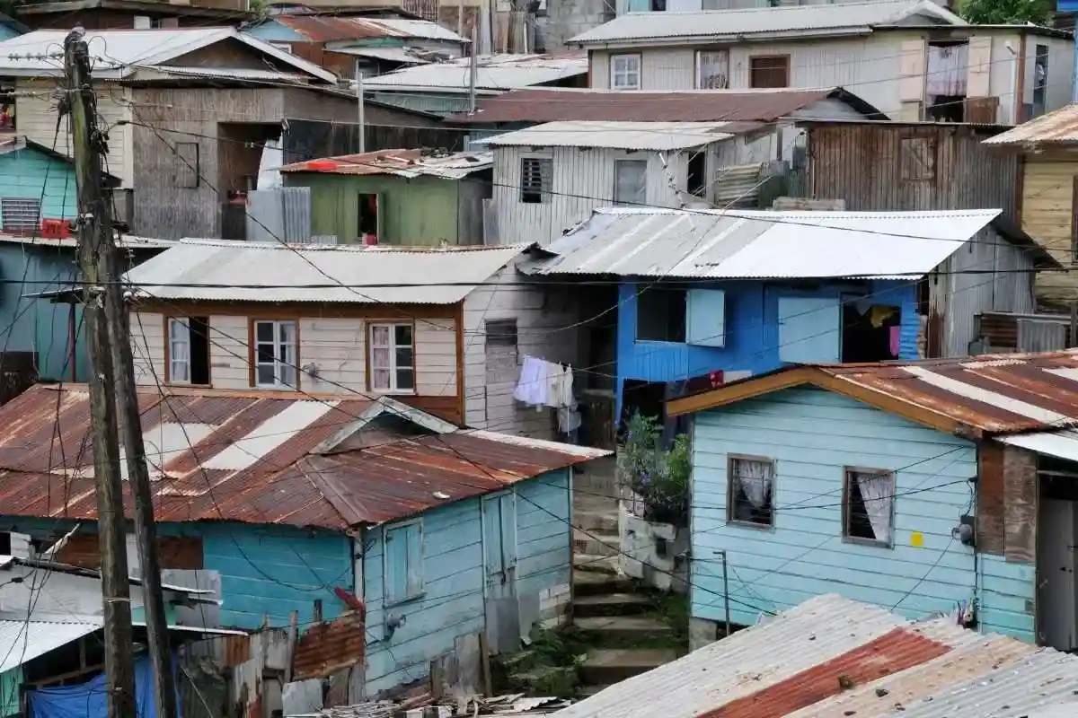 Examine who should bear the costs of climate change and discuss equitable solutions to managing its financial impacts.