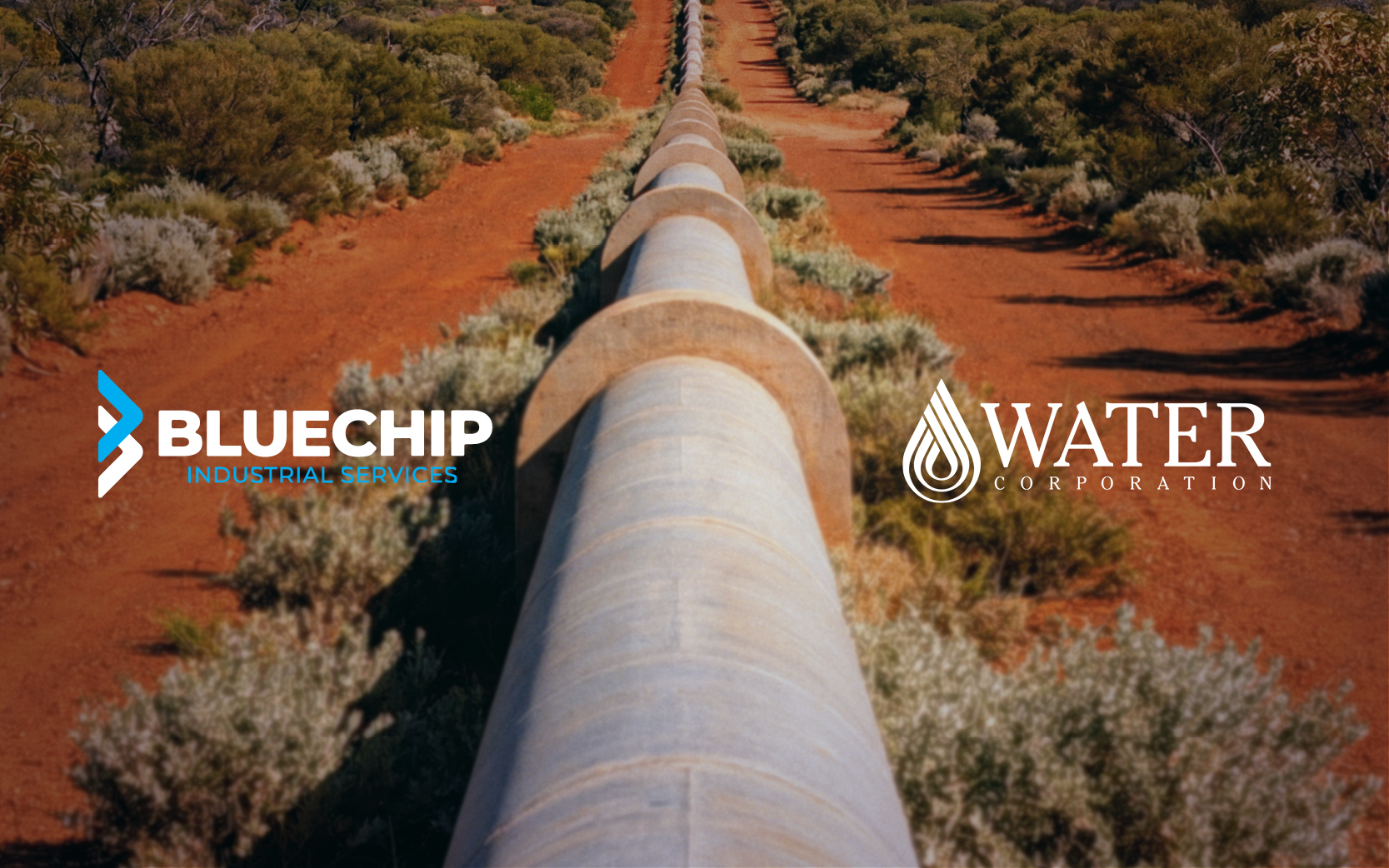 Long pipe running into the distance through red scrubland, with two logos overlaid