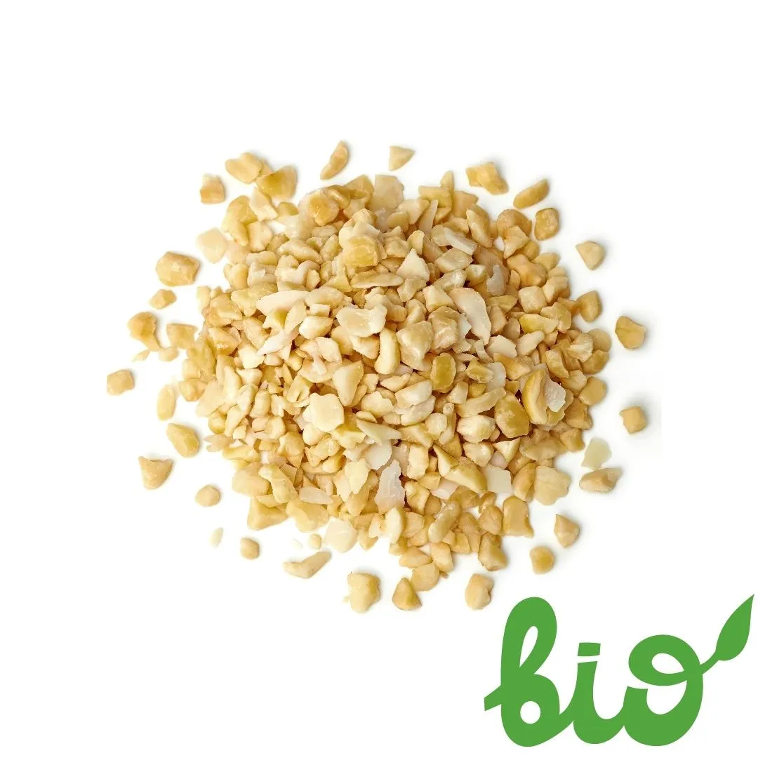 Burger with fried fries on black plate with sauce on the side