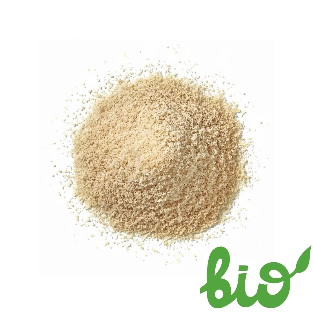 Burger with fried fries on black plate with sauce on the side