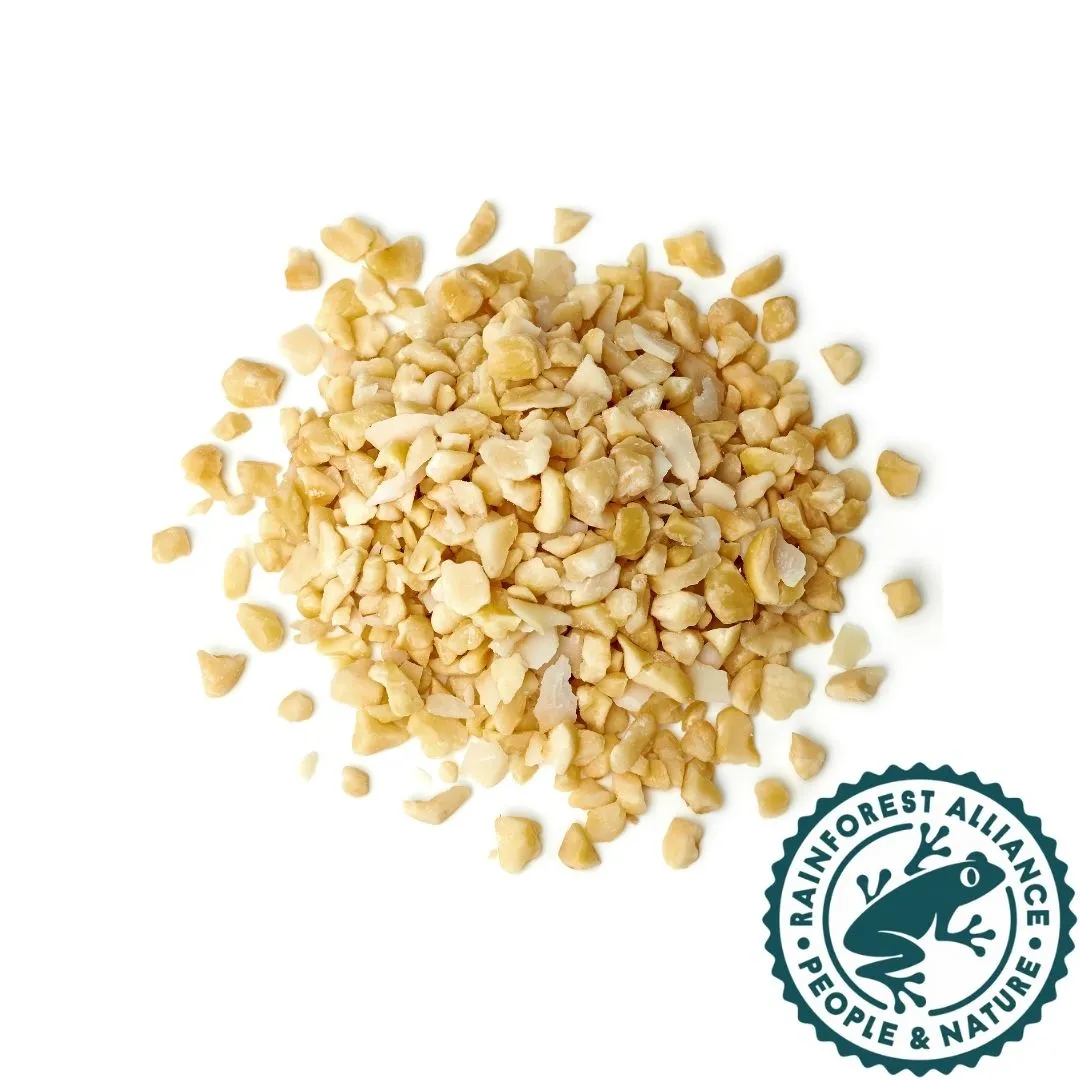 Burger with fried fries on black plate with sauce on the side