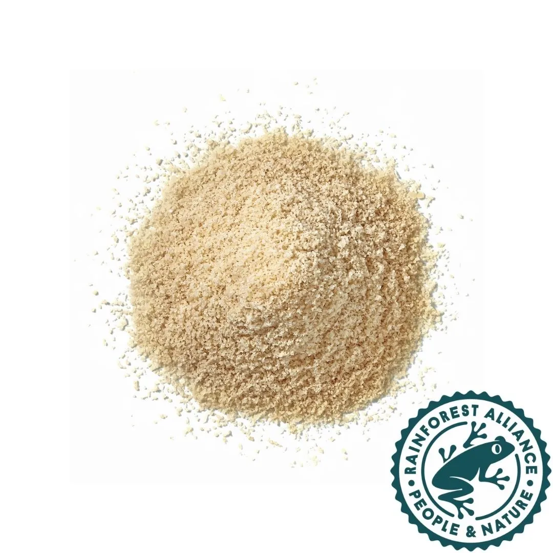 Burger with fried fries on black plate with sauce on the side