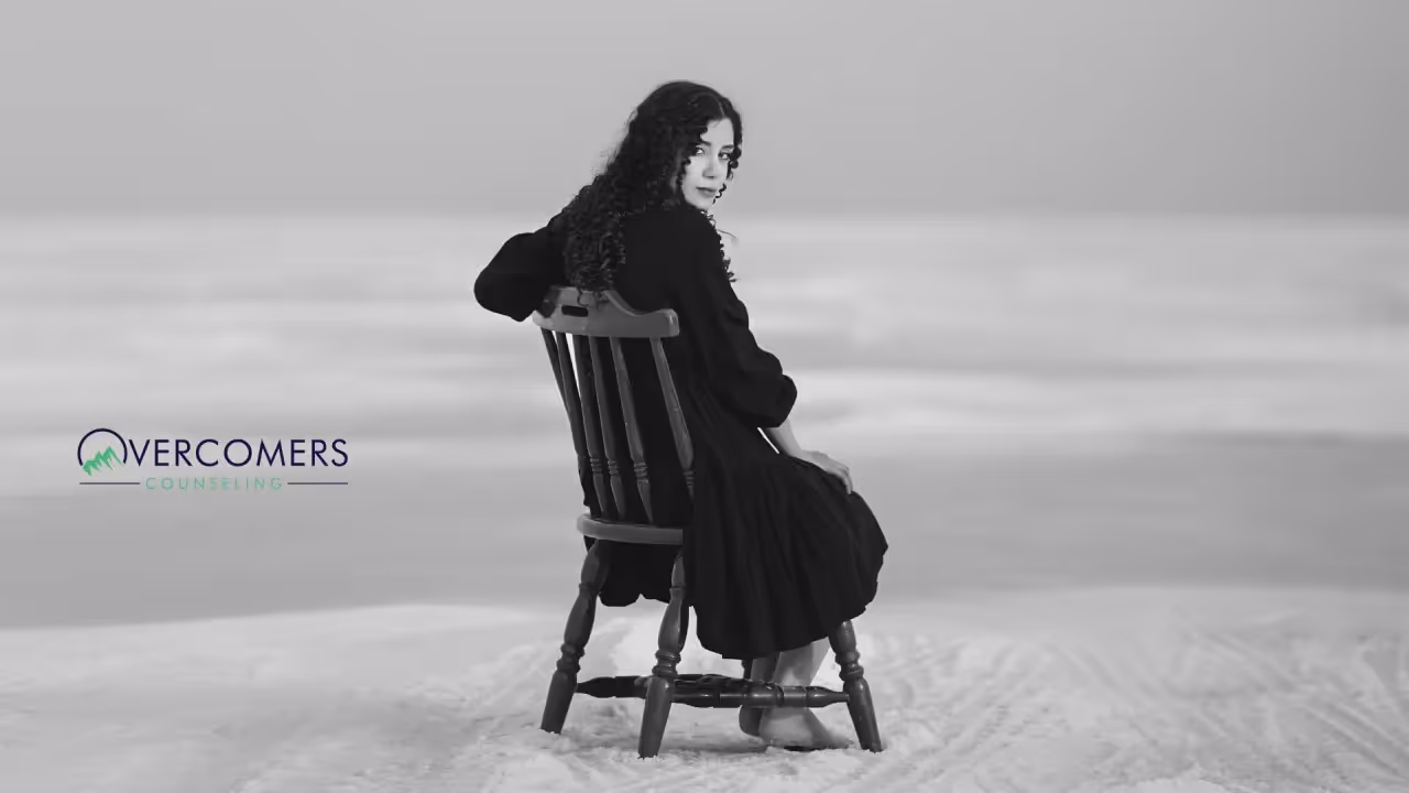 a person sitting alone in a chair