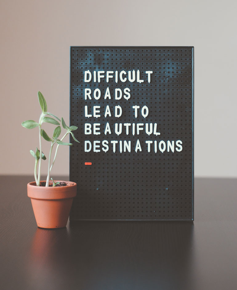 a message that says difficult roads lead to beautiful destinations