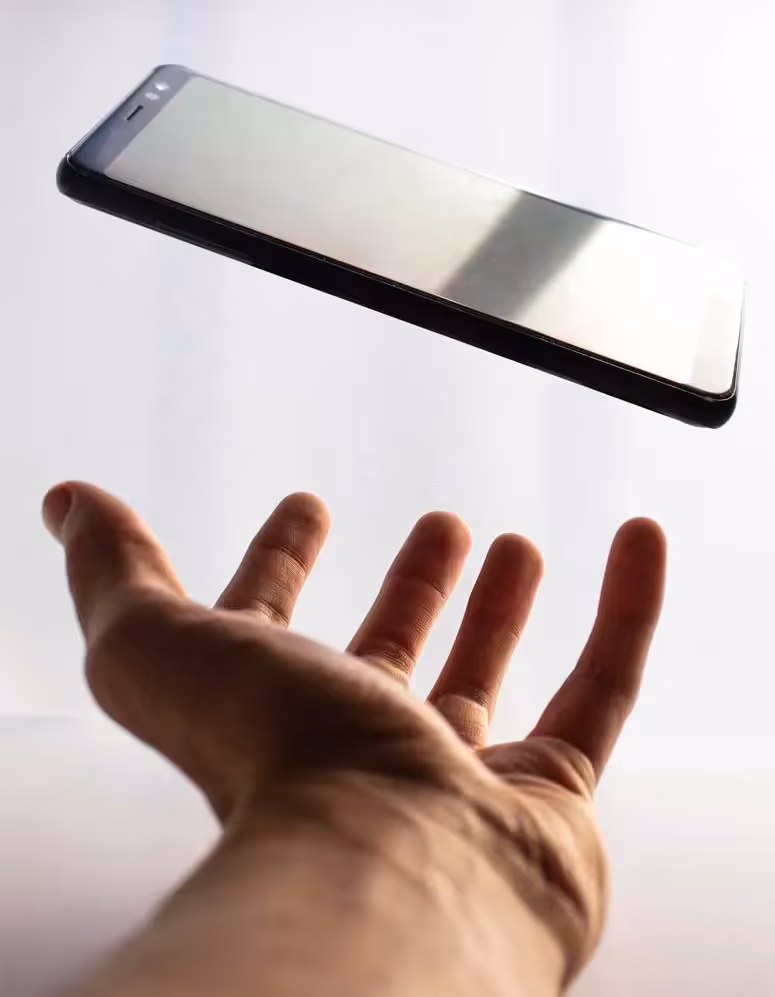 a hand and a phone