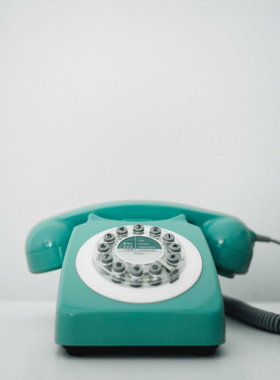 a rotary phone on a table