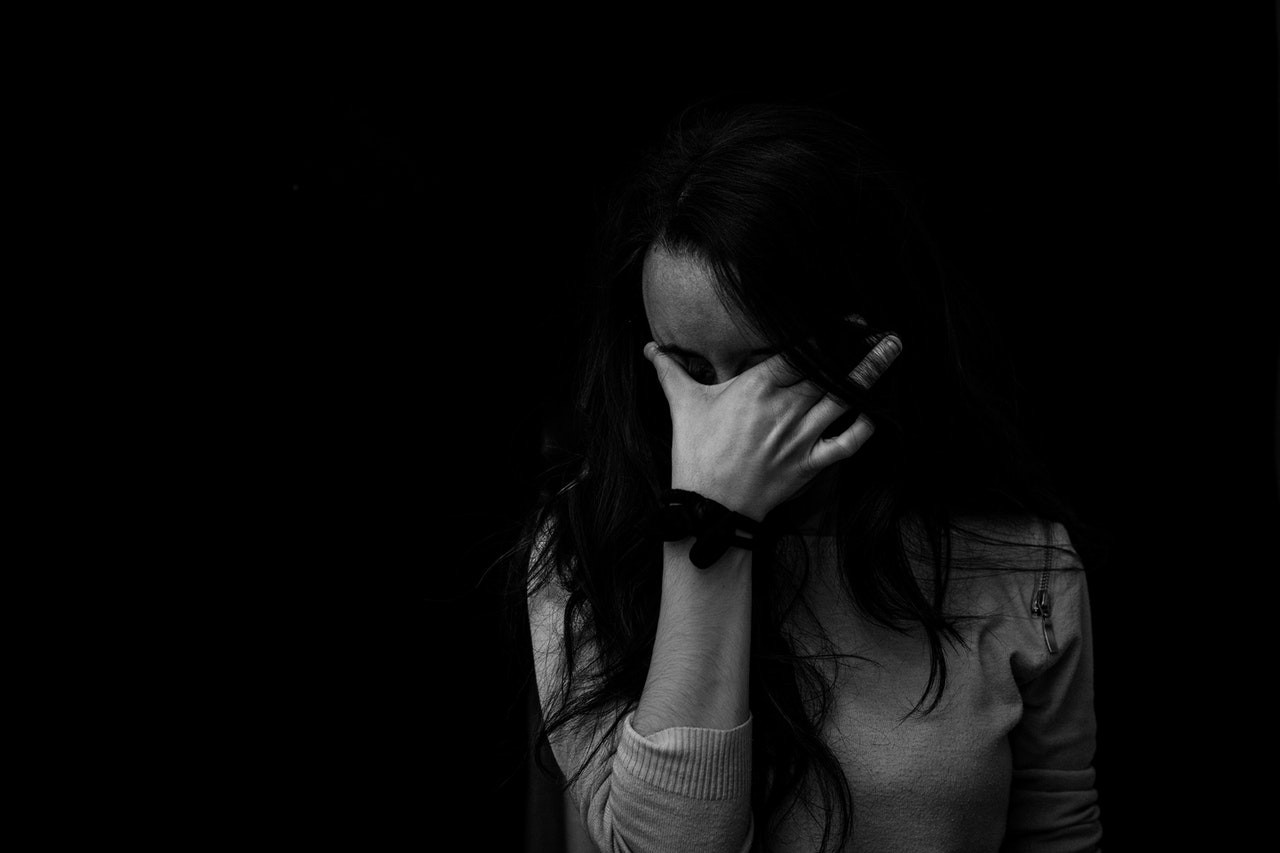 An agoraphobe in a dark corner
