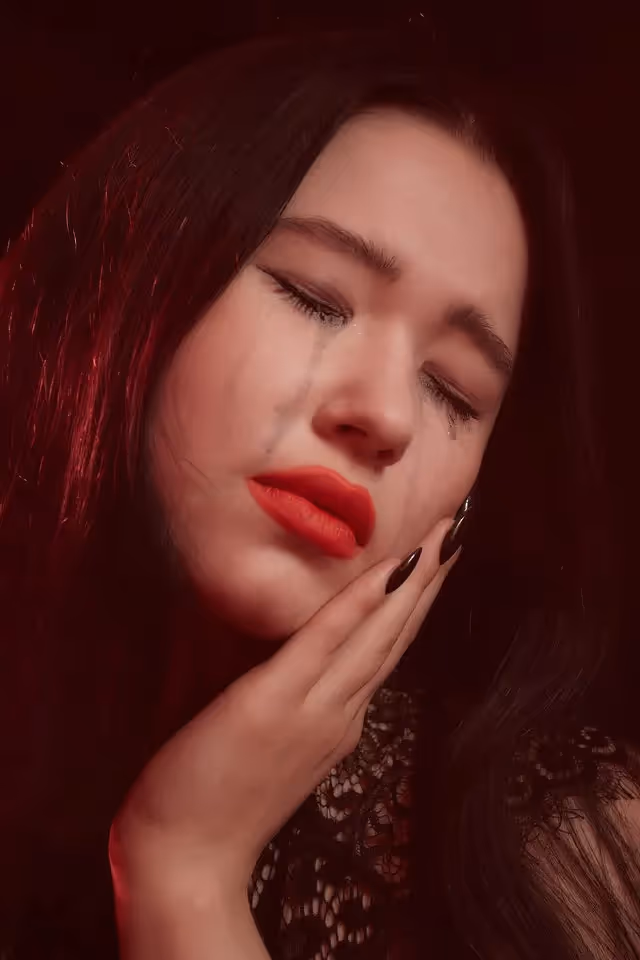 woman with making running down her face from crying