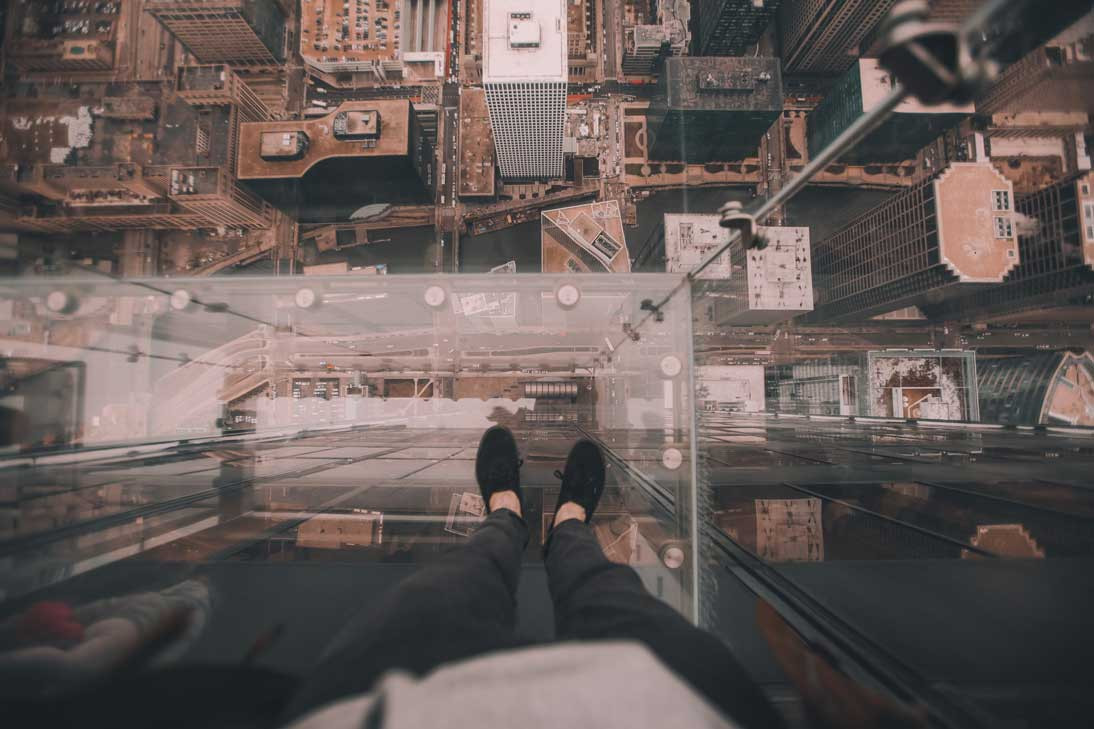 person looking over the view of a building