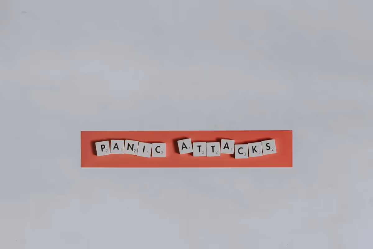 a young male with their eyes closed