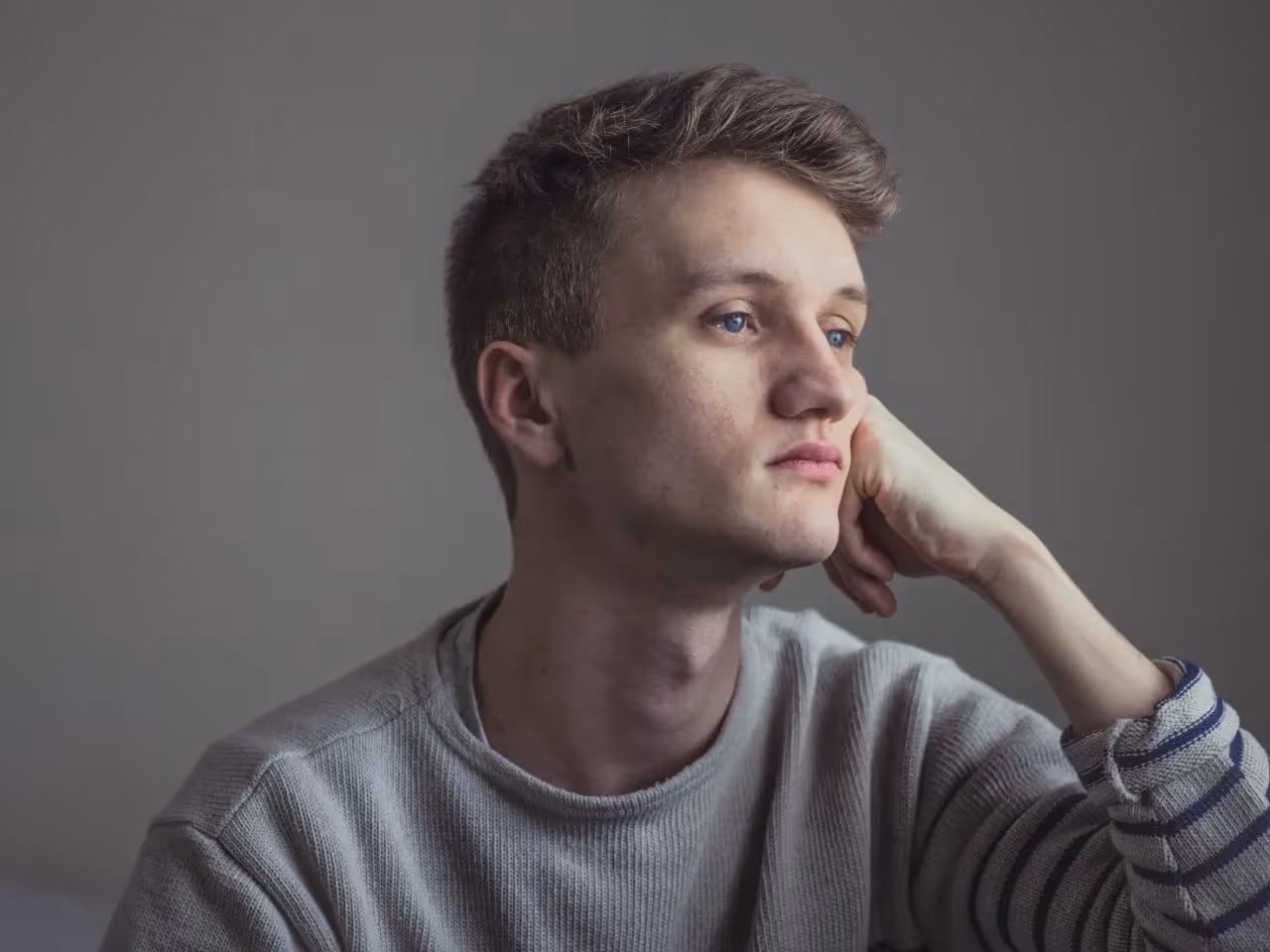 depressed man gazing into the distance