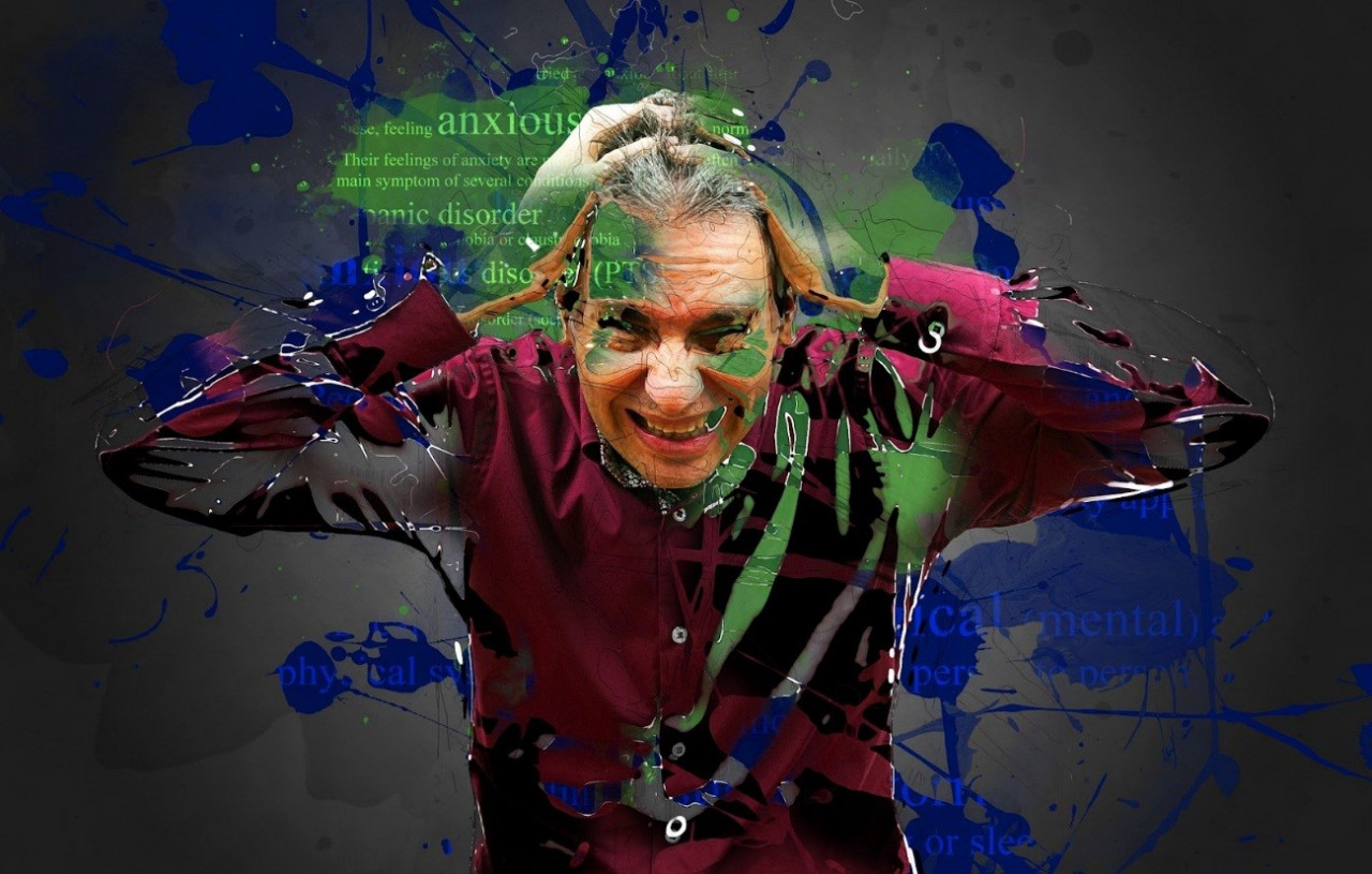 a man holding his head and different mental health words showing