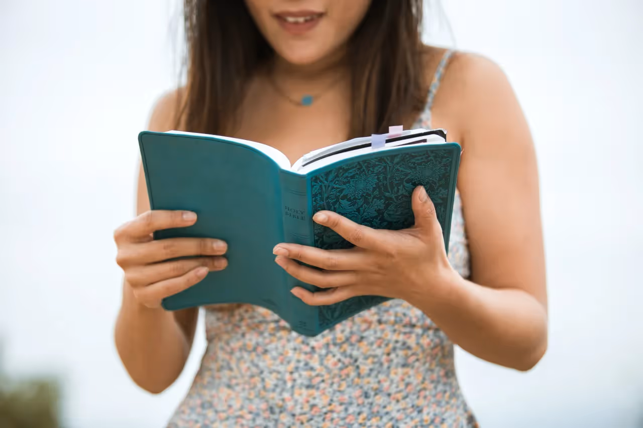 A woman reading a bible