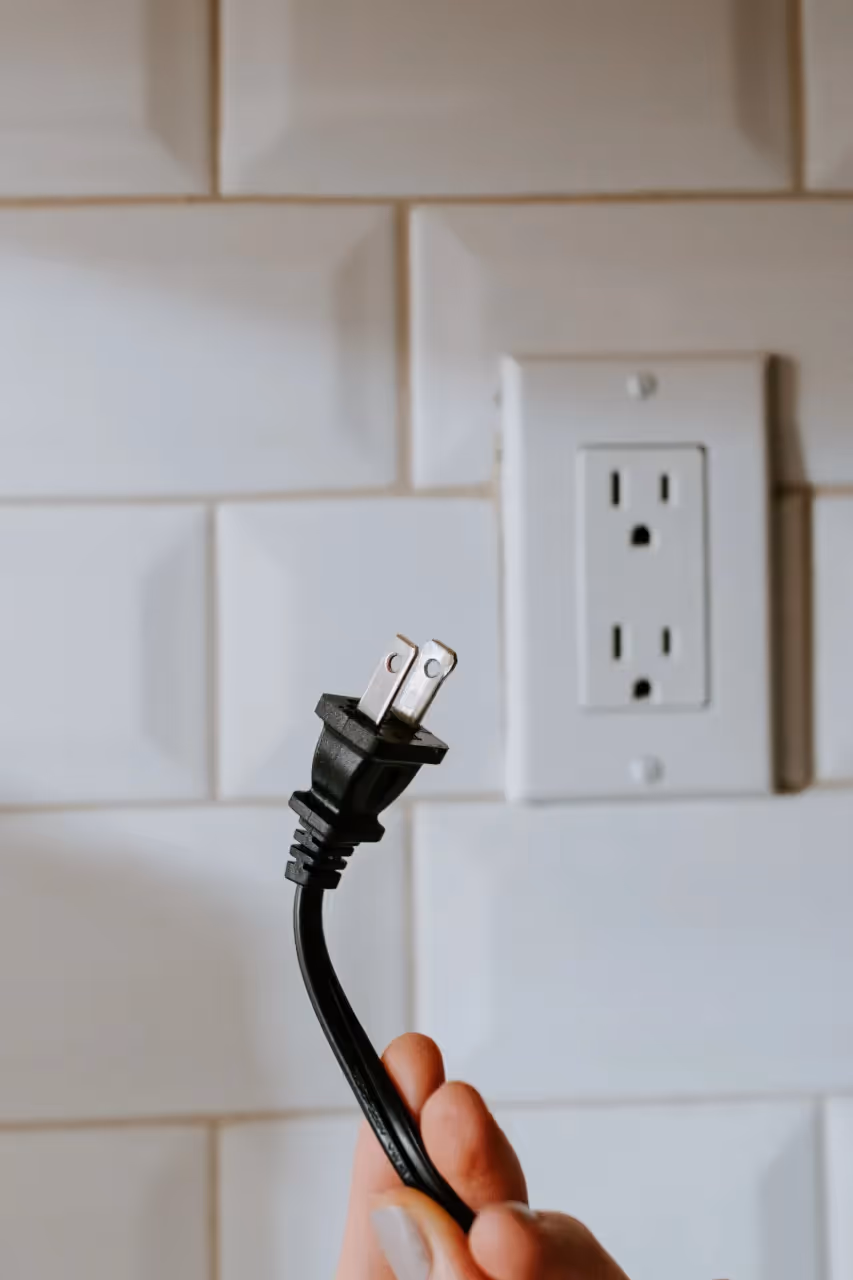 Cord unplugged from the wall socket