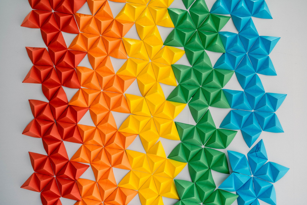 Repeated rainbow-colored paper