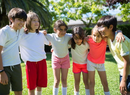 Group of kids huddling