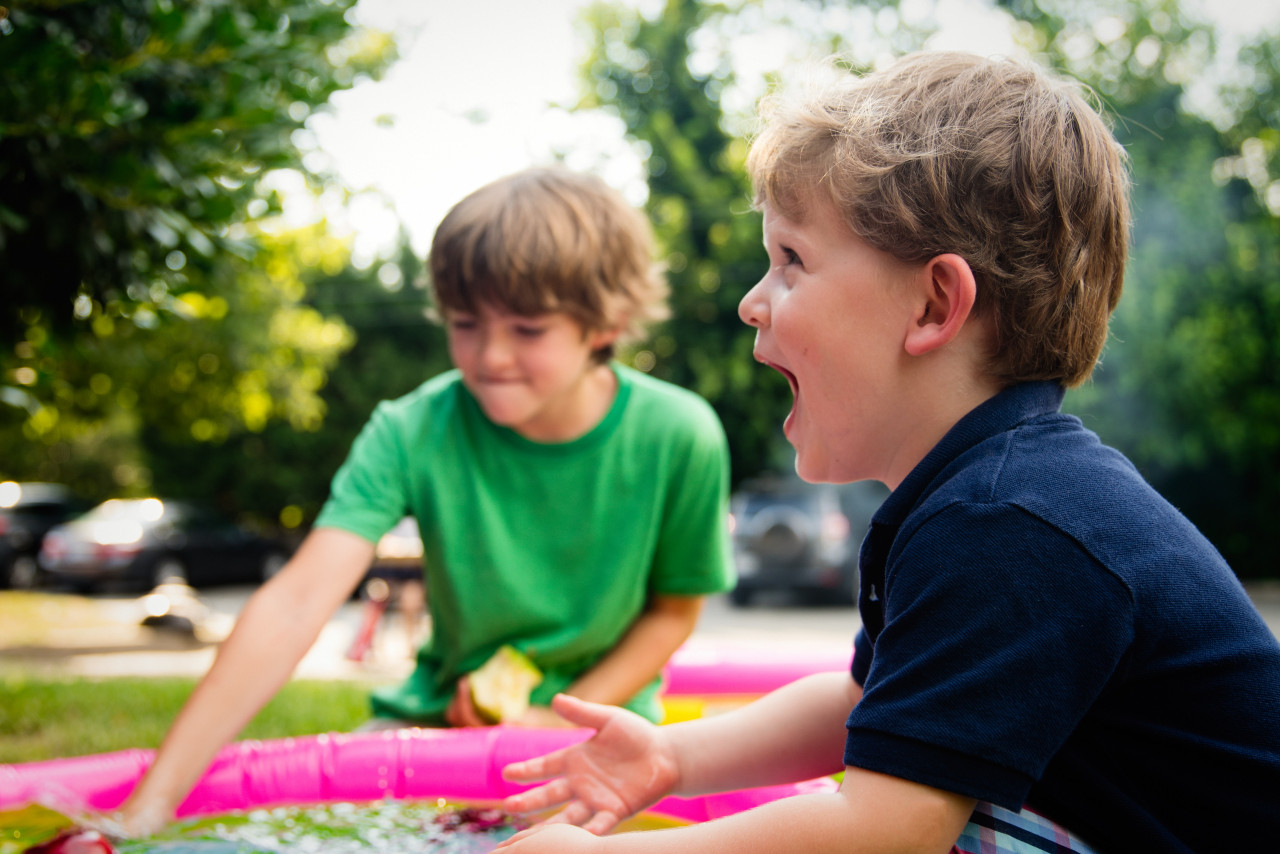 Two kids having fun.