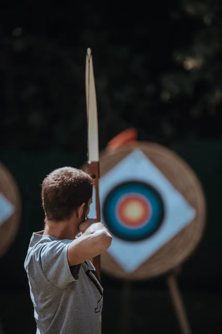 A man practicing archery.