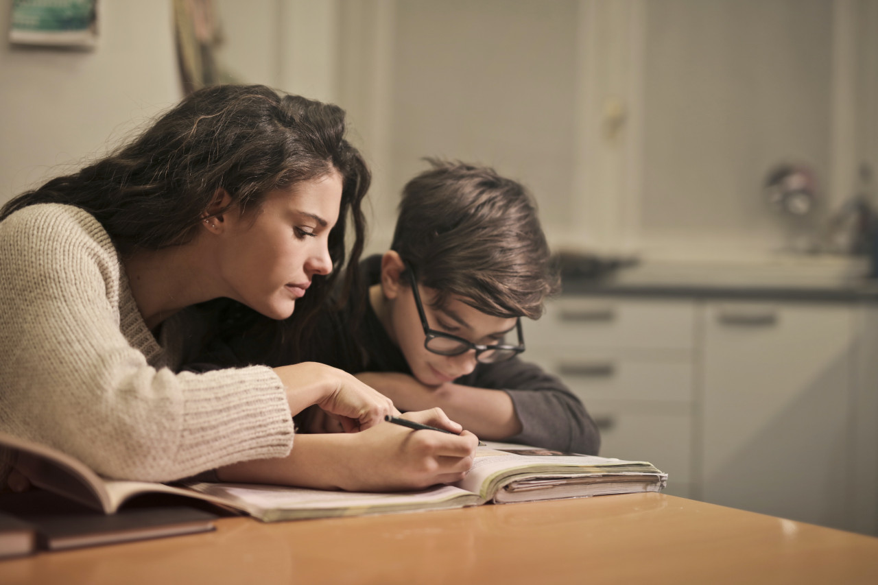 A mother helping her son with his decision-making.