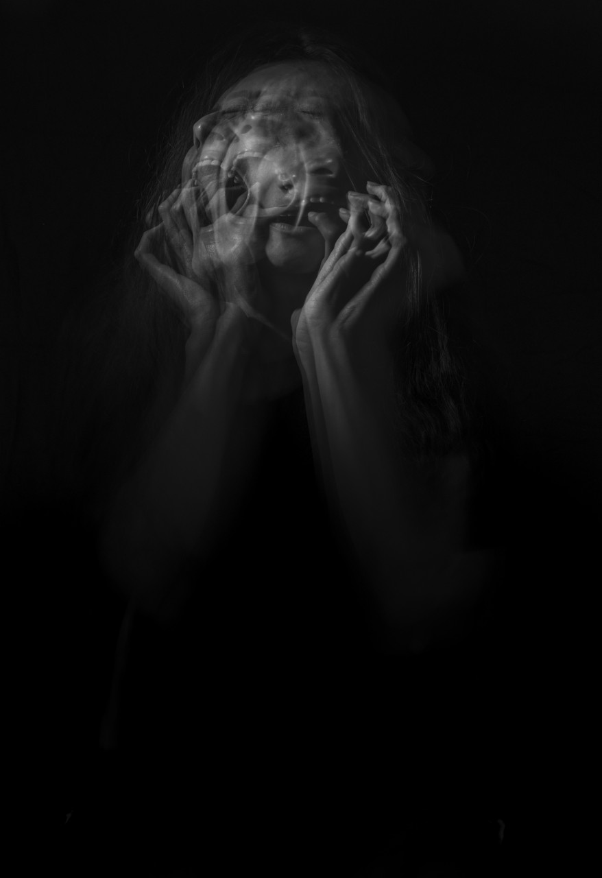 A lady experiencing strong negative emotions.