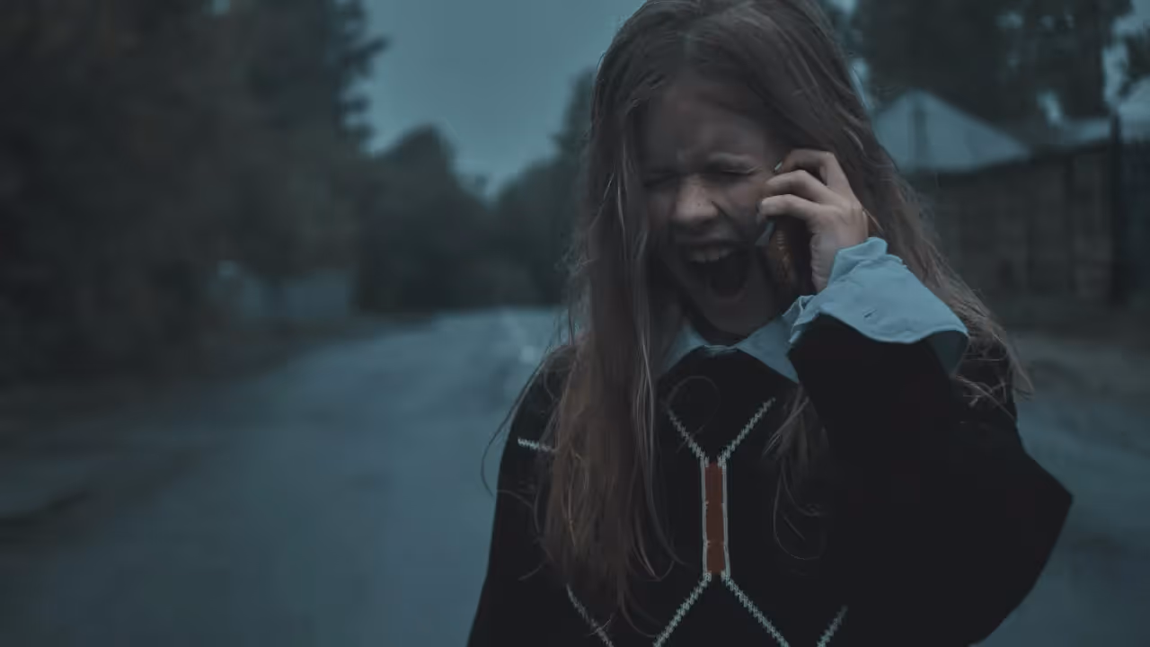 A woman shouting at someone on the other end of the call.