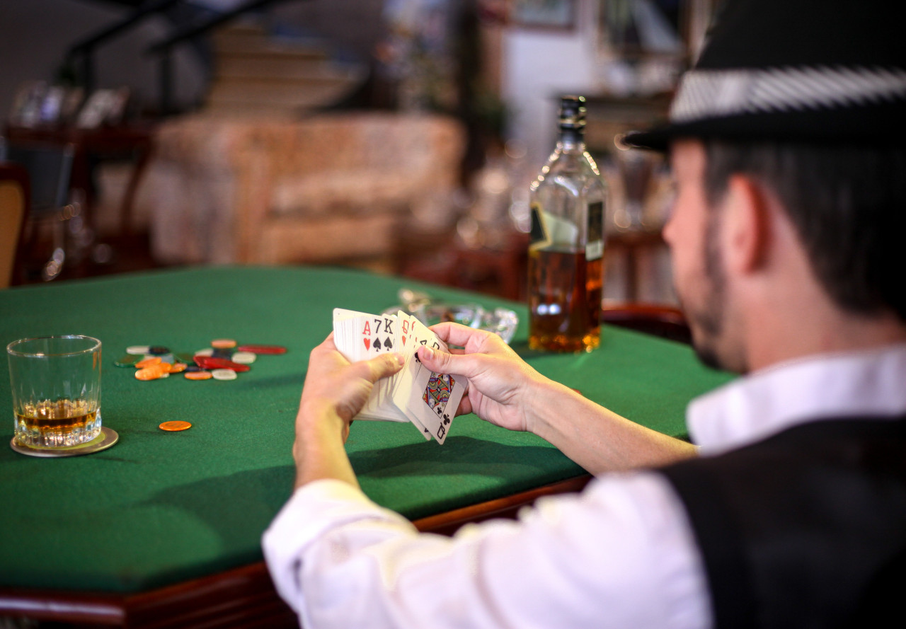 A man gambling in a casino.