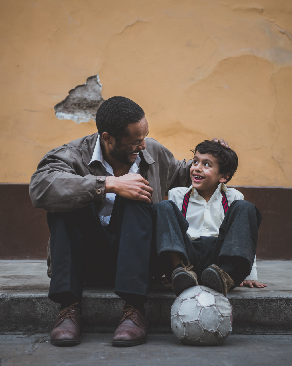 A father interested in his son's hobby.
