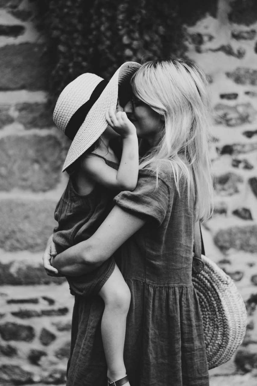 A mother talking to her child.
