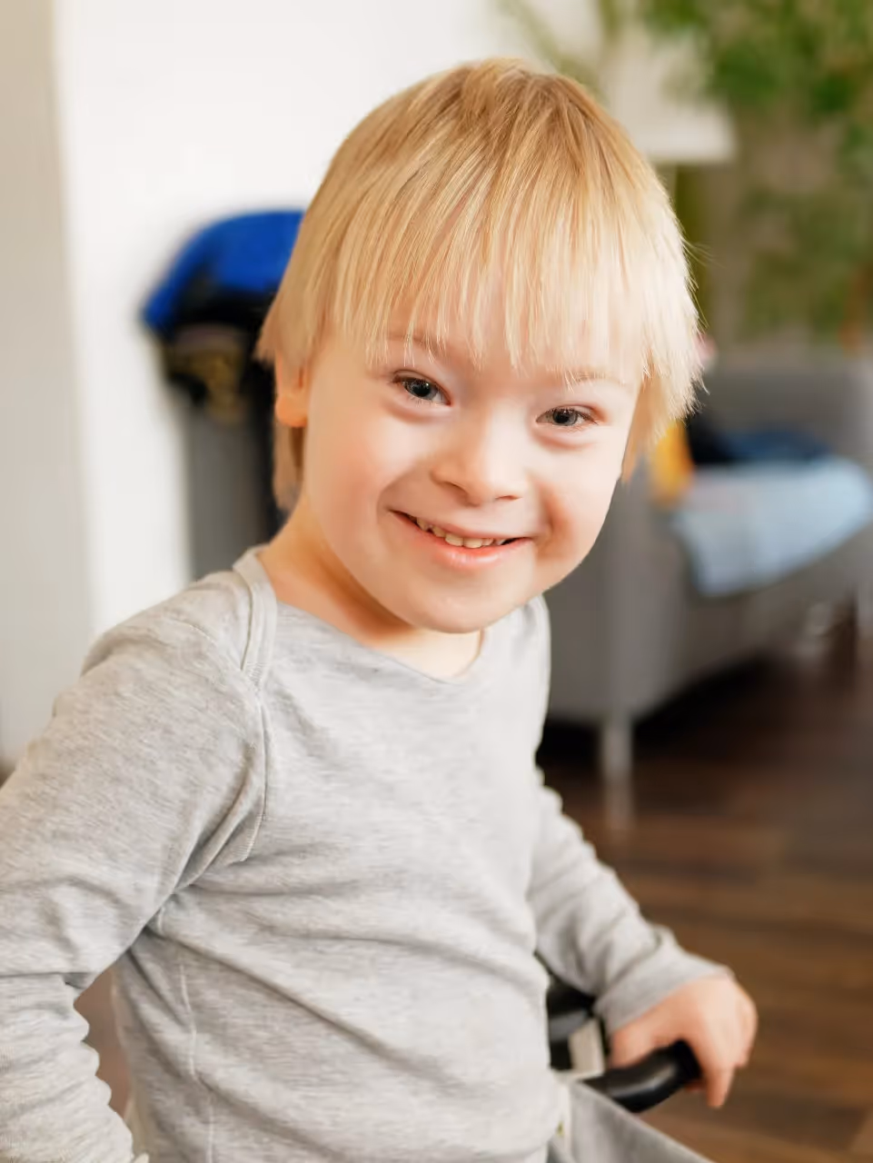A child with down syndrome smiling