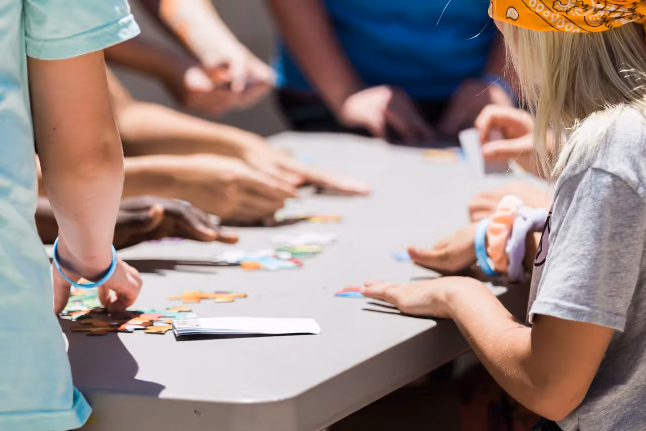 A group of friends playing a puzzle game.